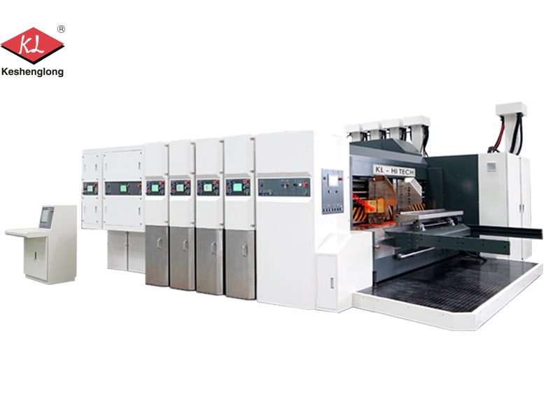 Machine de découpe et de rainurage pour imprimante flexo à transfert sous vide